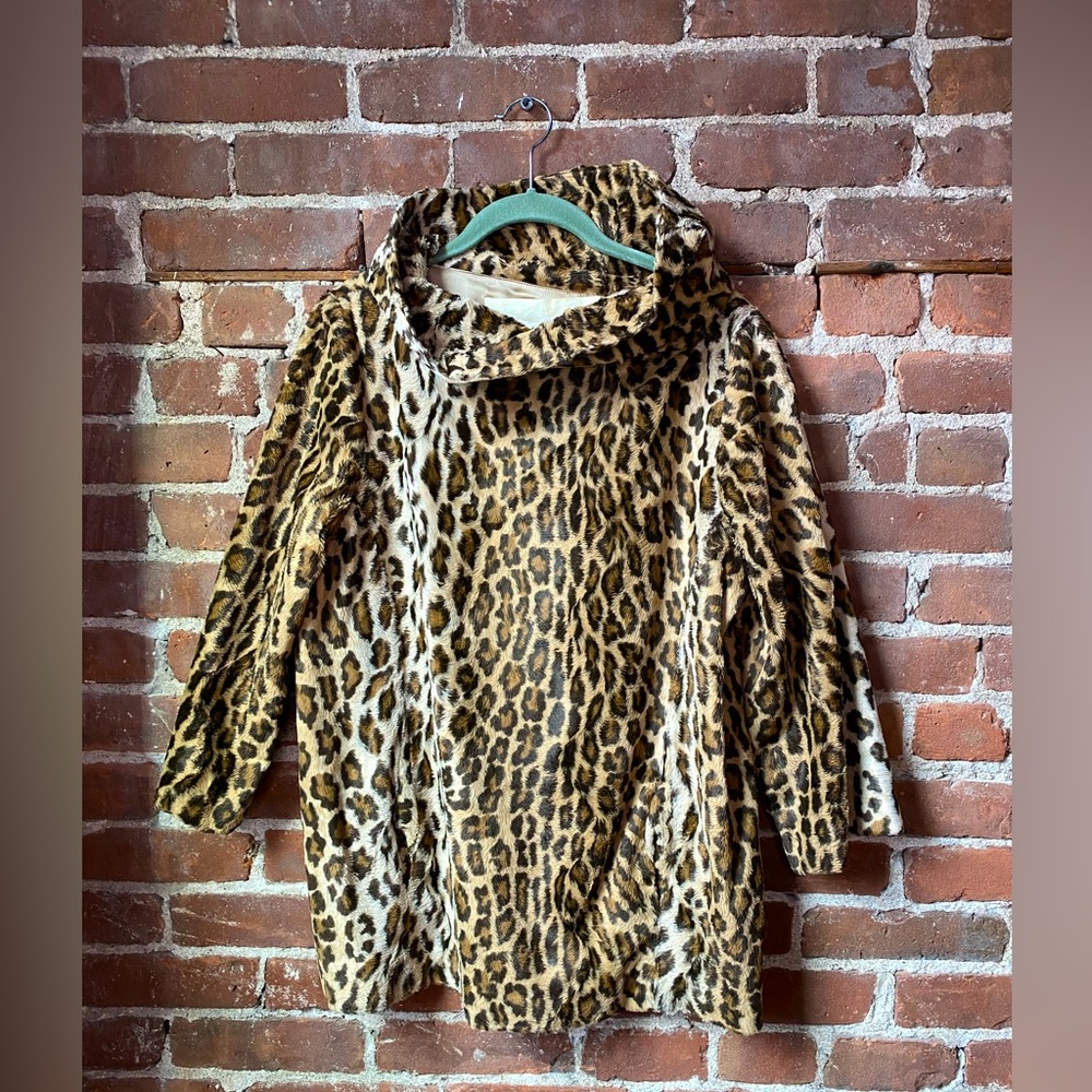 Cuddly, lined, Graham & Spencer animal printed faux fur tunic. Size small.